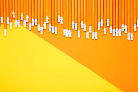 Yellow pencils on colorful backgroundの写真素材