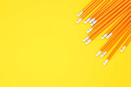Yellow pencils on yellow backgroundの写真素材
