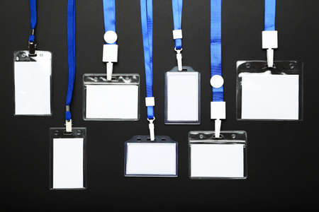 Blank white bagdes on black backgroundの写真素材