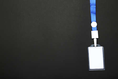 Blank white bagde on black backgroundの写真素材