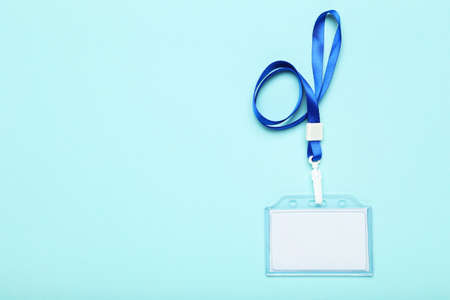 Blank white bagde on blue backgroundの写真素材