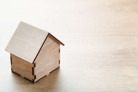 House model on wooden backgroundの写真素材