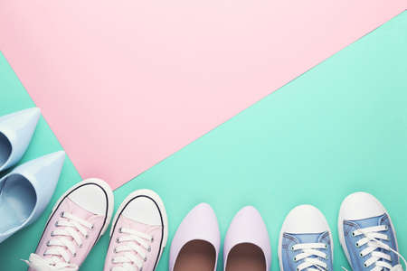 Different female shoes on colorful backgroundの写真素材