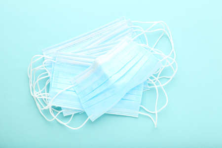 Medicine face masks on blue backgroundの写真素材