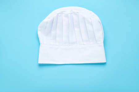 Chef hat on blue background