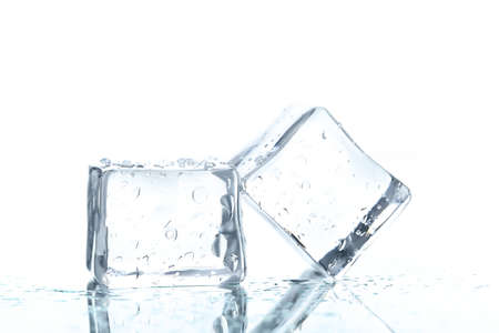 Ice cubes with water drops on white background