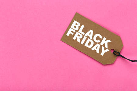 Sale tag with text Black Friday on pink backgroundの写真素材