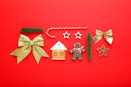 Christmas ornaments with cookies on red backgroundの写真素材