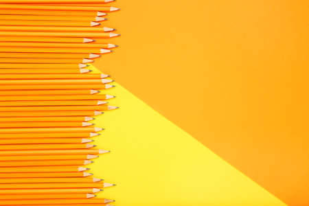 Yellow pencils on colorful backgroundの写真素材