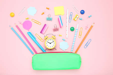 School supplies on pink background
