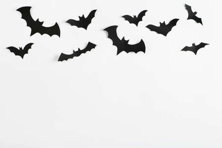 Halloween paper bats on grey backgroundの写真素材