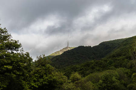 Radio tower on top of the hillの写真素材