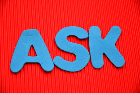 ASK WORD on an red backgroundの写真素材