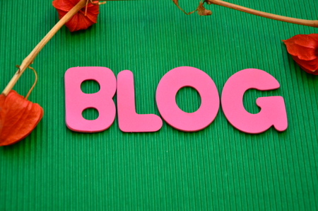 word blog on an green backgroundの写真素材