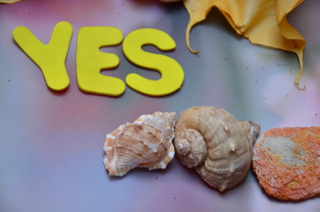 WORD YES on an abstract backgroundの写真素材