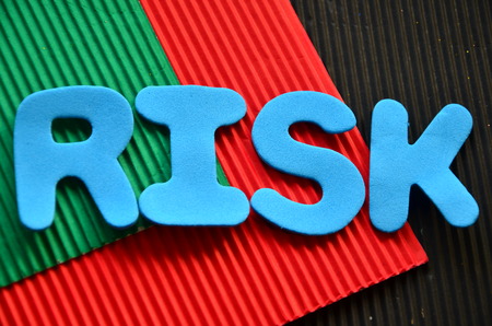 word risk on an abstract backgroundの写真素材