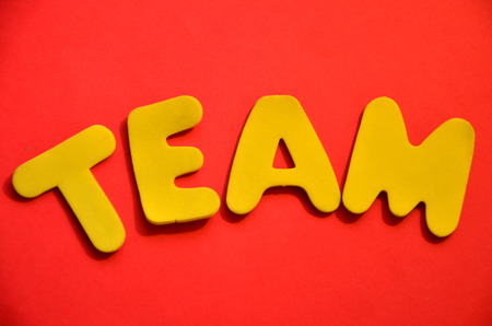 word team on an red backgroundの写真素材