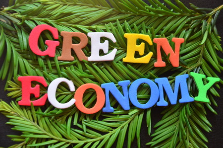 WORD GREEN ECONOMY on an abstract backgroundの写真素材
