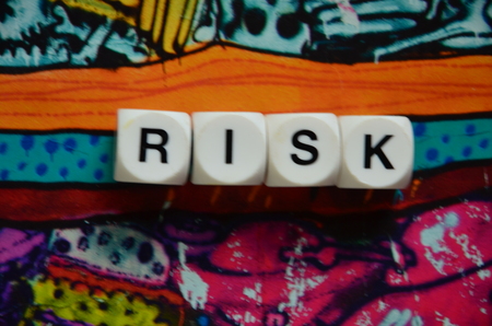 word risk on an abstract backgroundの写真素材