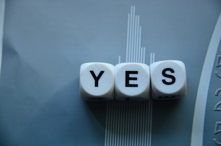 WORD YES on an abstract backgroundの写真素材