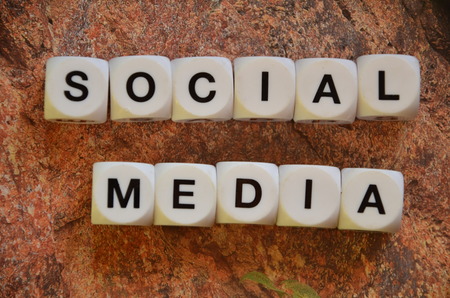 SOCIAL MEDIA WORD on an abstract colored backgroundの写真素材