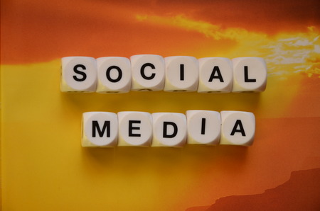 SOCIAL MEDIA WORD on an abstract colored backgroundの写真素材