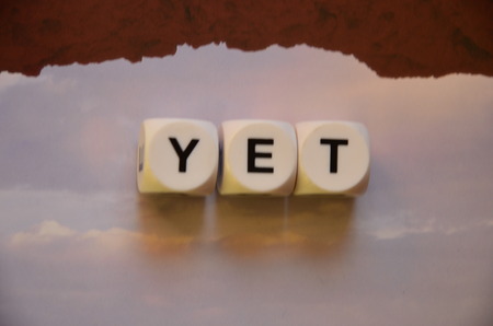 word yet on an abstract backgroundの写真素材
