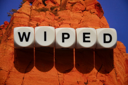 word wiped on an abstractly colored backgroundの写真素材