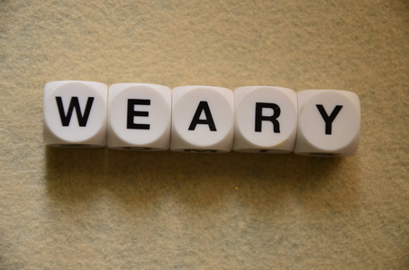 word wears on an abstractly colored backgroundの写真素材