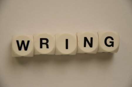 word wring on an abstractly colored backgroundの写真素材