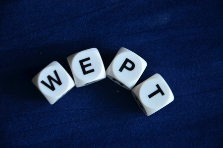 word wept on an blue backgroundの写真素材