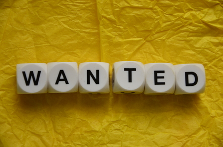 word wanted on an abstract backgroundの写真素材