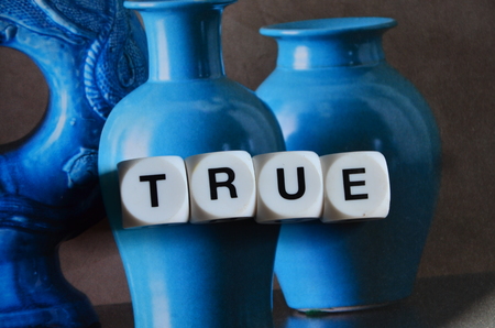 wor true on an abstract backgroundの写真素材