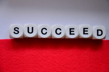 word succeedon an colorec backgroundの写真素材
