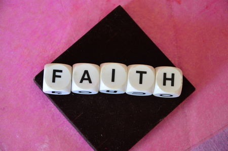 word faith on an abstract backgroundの写真素材