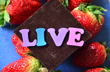 word live on an abstract backgroundの写真素材