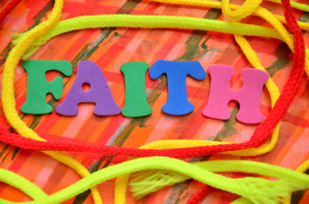 word faith on an abstract backgroundの写真素材