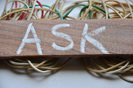 word ask on an abstract backgroundの写真素材