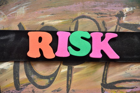 word risk on an abstract backgroundの写真素材