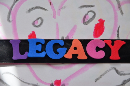 Word legacy on an abstract background