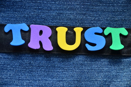 word trust on an abstract backgroundの写真素材