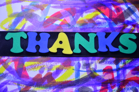 word thanks on an abstract backgroundの写真素材