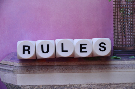 Word rules on an abstract backgroundの写真素材