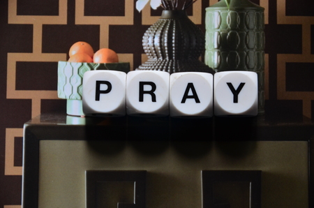 word pray on an abstract backgroundの写真素材