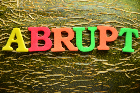 word abrupt on an abstract backgroundの写真素材