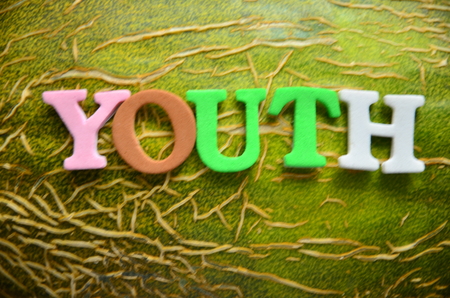 Word YOUTH on an abstract backgroundの写真素材