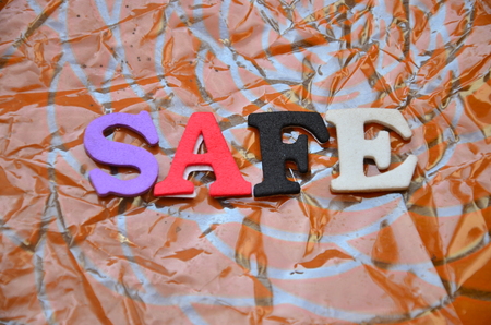 Word safe on an abstract backgroundの写真素材