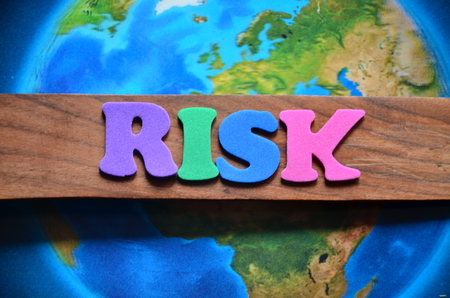 word risk on an abstract backgroundの写真素材
