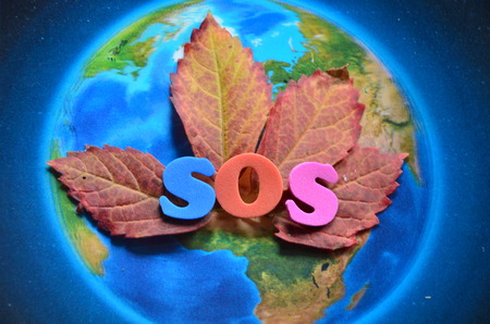 word sos on an abstract background