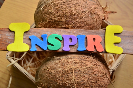 word inspire on an abstract backgroundの写真素材